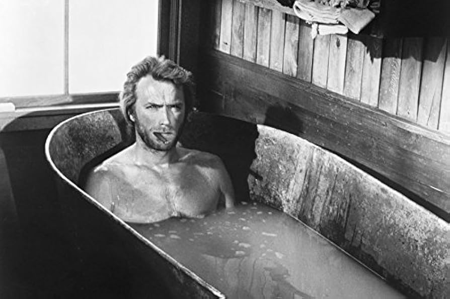ポスター　CLINT EASTWOOD Amazon.com: Clint Eastwood High Plains Drifter sits in tub